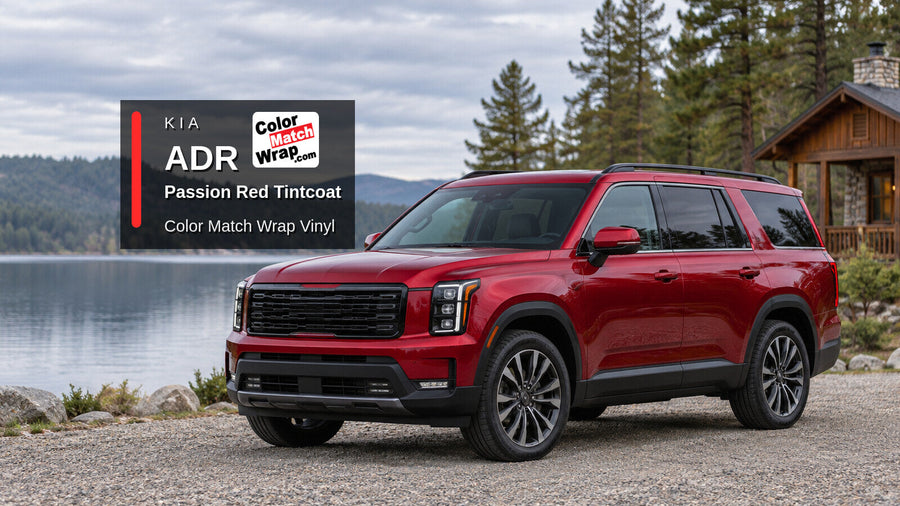 Illustrative three-row SUV in Kia ADR Passion Red Tintcoat with Color Match Wrap branding