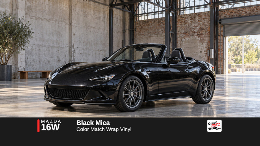 Illustrative MX-5 Miata-inspired roadster in Mazda 16W Black Mica with Color Match Wrap branding