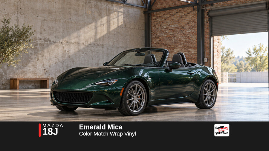 Illustrative MX-5 Miata-inspired roadster in Mazda 18J Emerald Mica with Color Match Wrap branding