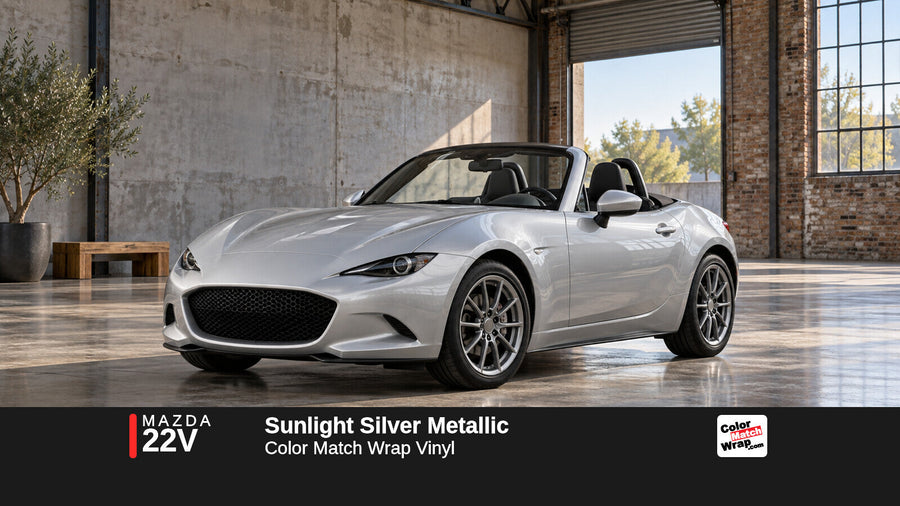 Illustrative MX-5 Miata-inspired roadster in Mazda 22V Sunlight Silver Metallic with Color Match Wrap branding