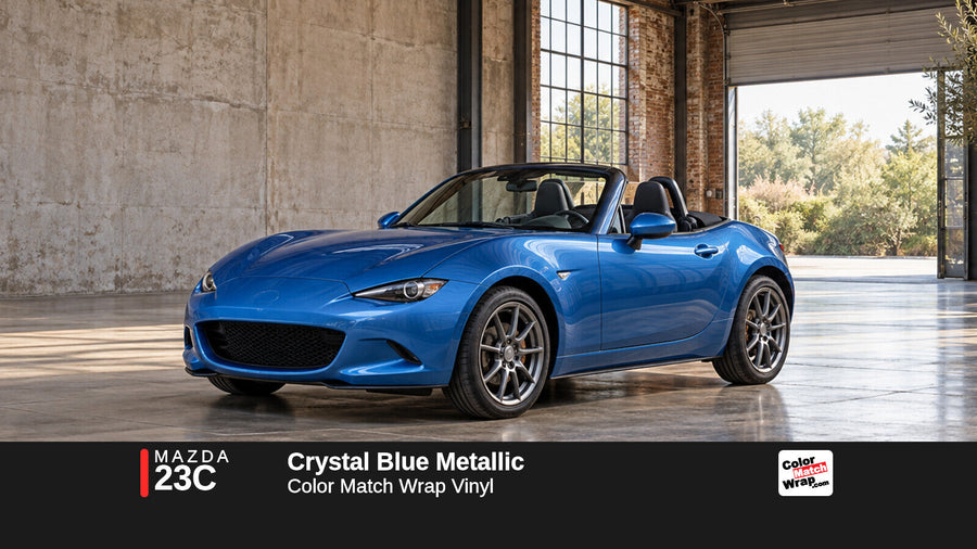 Illustrative MX-5 Miata-inspired roadster in Mazda 23C Crystal Blue Metallic with Color Match Wrap branding