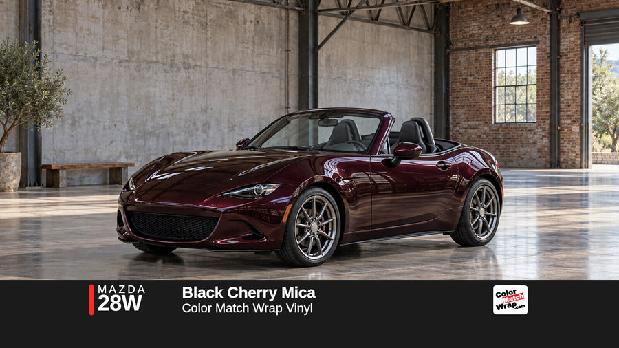 Illustrative MX-5 Miata-inspired roadster in Mazda 28W Black Cherry Mica with Color Match Wrap branding