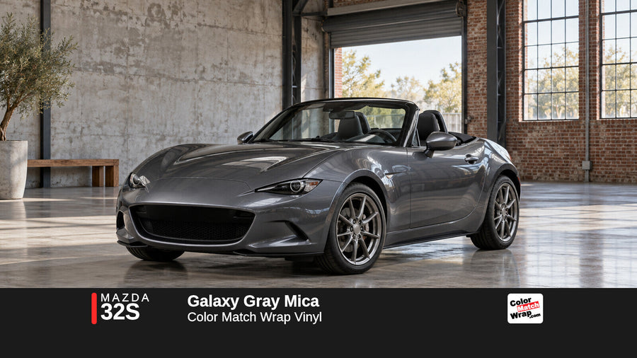 Illustrative MX-5 Miata-inspired roadster in Mazda 32S Galaxy Gray Mica with Color Match Wrap branding
