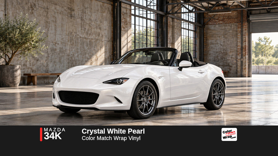 Illustrative MX-5 Miata-inspired roadster in Mazda 34K Crystal White Pearl with Color Match Wrap branding