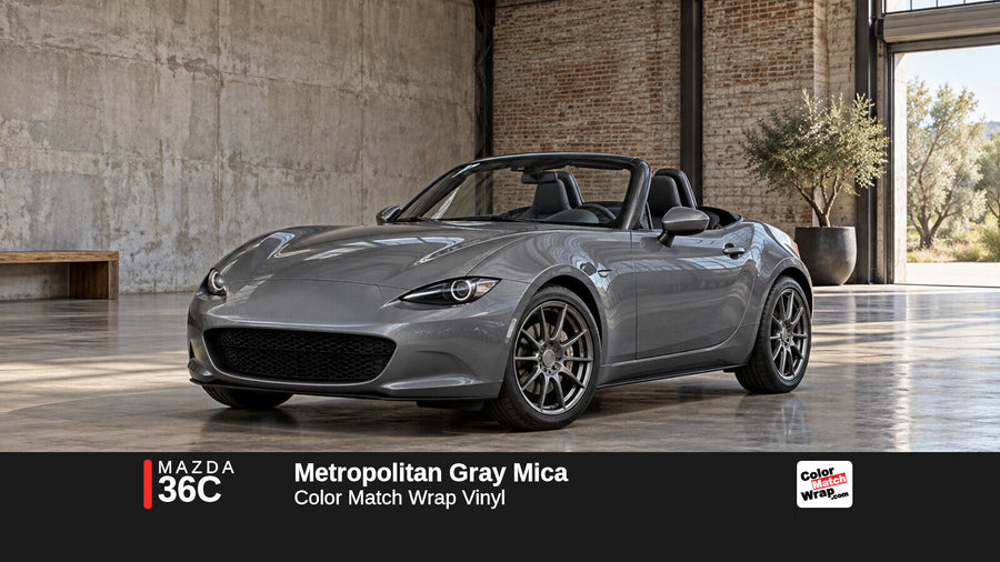 Illustrative MX-5 Miata-inspired roadster in Mazda 36C Metropolitan Gray Mica with Color Match Wrap branding