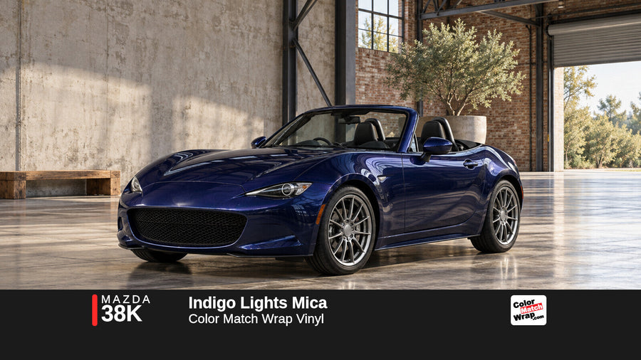 Illustrative MX-5 Miata-inspired roadster in Mazda 38K Indigo Lights Mica with Color Match Wrap branding