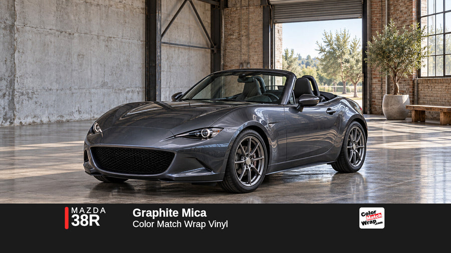 Illustrative MX-5 Miata-inspired roadster in Mazda 38R Graphite Mica with Color Match Wrap branding