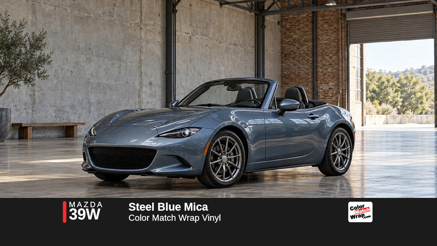Illustrative MX-5 Miata-inspired roadster in Mazda 39W Steel Blue Mica with Color Match Wrap branding