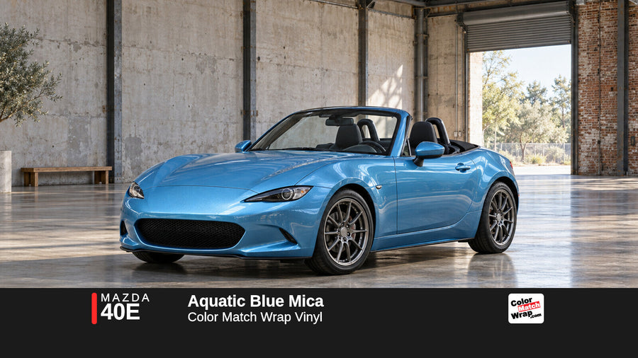 Illustrative MX-5 Miata-inspired roadster in Mazda 40E Aquatic Blue Mica with Color Match Wrap branding
