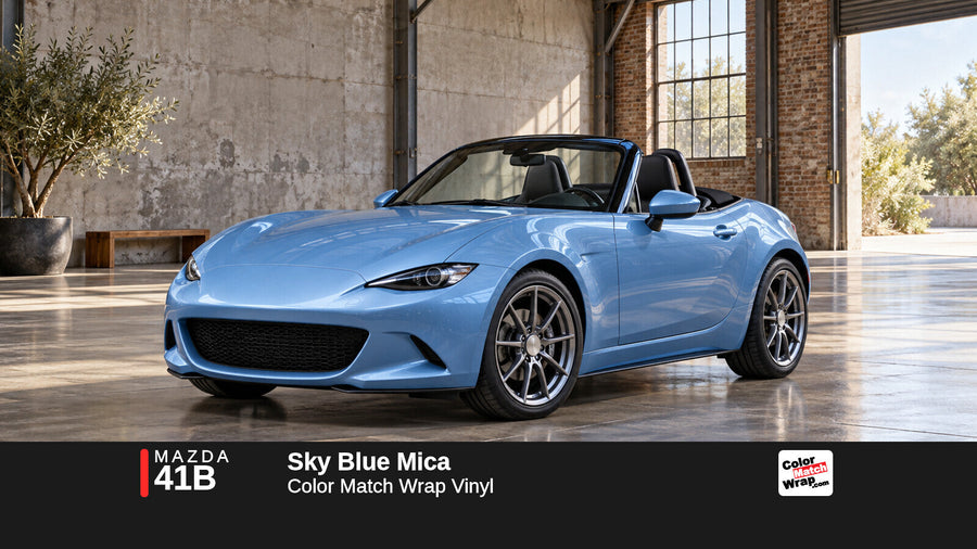 Illustrative MX-5 Miata-inspired roadster in Mazda 41B Sky Blue Mica with Color Match Wrap branding