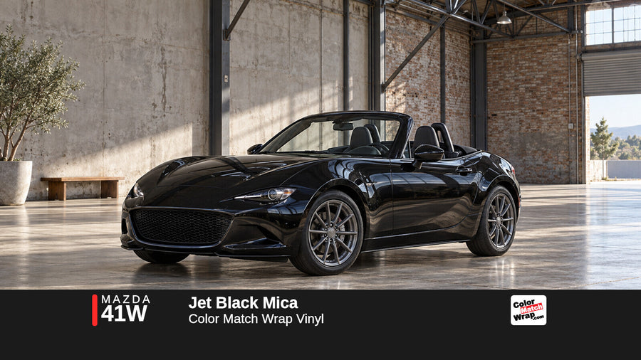 Illustrative MX-5 Miata-inspired roadster in Mazda 41W Jet Black Mica with Color Match Wrap branding