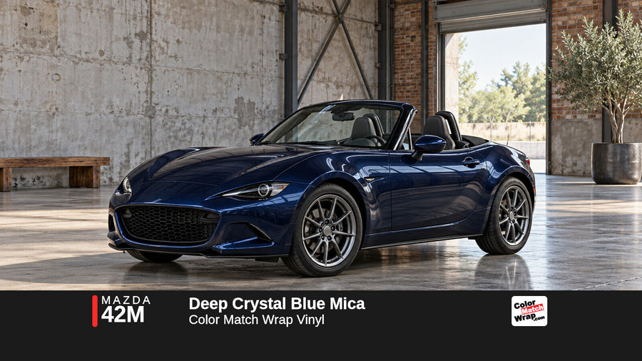 Illustrative MX-5 Miata-inspired roadster in Mazda 42M Deep Crystal Blue Mica with Color Match Wrap branding