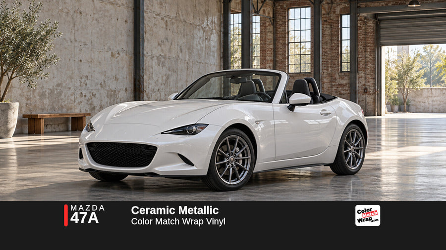 Illustrative MX-5 Miata-inspired roadster in Mazda 47A Ceramic Metallic with Color Match Wrap branding
