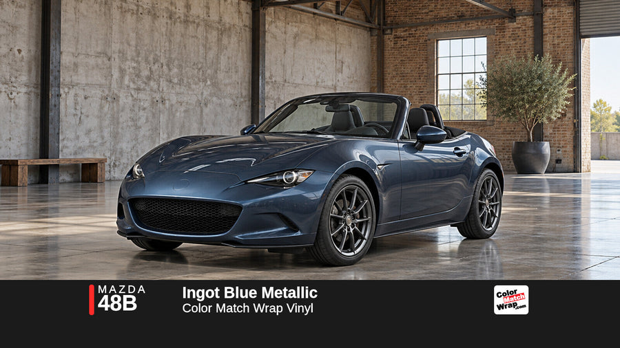 Illustrative MX-5 Miata-inspired roadster in Mazda 48B Ingot Blue Metallic with Color Match Wrap branding