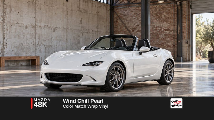 Illustrative MX-5 Miata-inspired roadster in Mazda 48K Wind Chill Pearl with Color Match Wrap branding