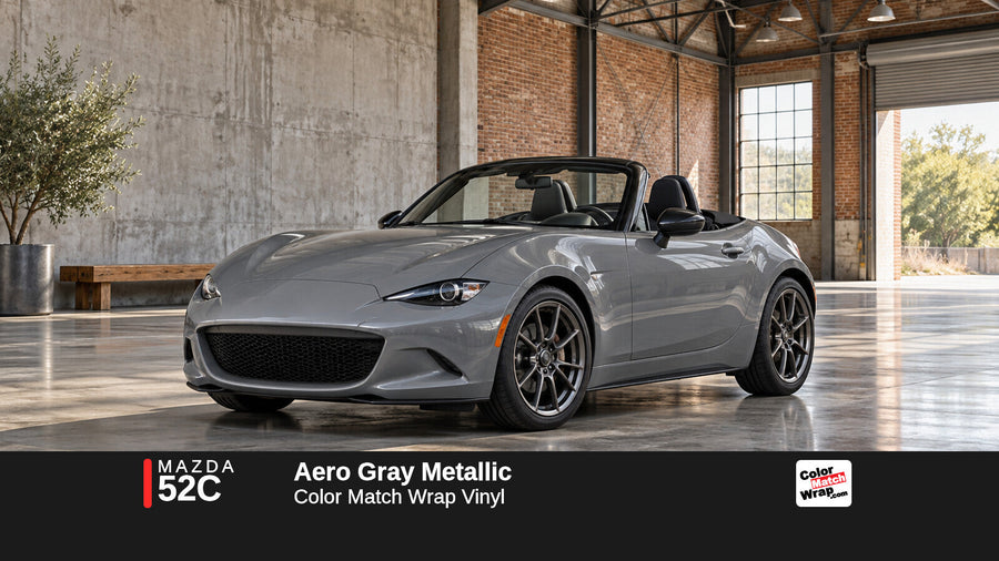 Illustrative MX-5 Miata-inspired roadster in Mazda 52C Aero Gray Metallic with Color Match Wrap branding
