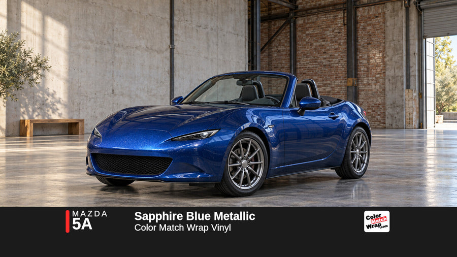 Illustrative MX-5 Miata-inspired roadster in Mazda 5A Sapphire Blue Metallic with Color Match Wrap branding
